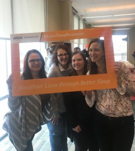 smiling coworkers support sleep research