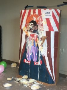 carnival game pie throwing booth